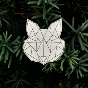 Gray fox reflector with geometric pattern on green background
